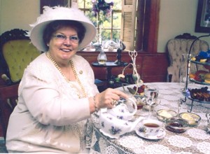 The “Tea Lady,” Constance Lue, pours tea. (Submitted photo)