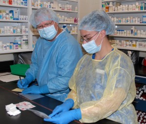 VGCC students (from left) R.J. Catchings and Kelly McKenna Evans train in the Pharmacy Technology lab on Main Campus. (VGCC photo)