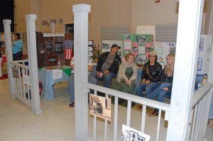 VGCC History instructor Victoria Klesmith (center, in period attire) and students created a booth on the American front porch for the 2013 Cultural Fair. (VGCC photo)