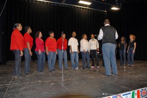 On stage at the 2013 Cultural Fair, VGCC instructor Steven Hargrove leads a choir of faculty, staff and students. (VGCC photo)