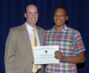 From left, VGCC men’s basketball Coach Mike Rotolo presents an award to player Khadier Fulcher. (VGCC photo)