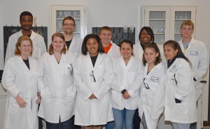 In front row, from left: VGCC instructor Dr. Tara Hamilton, students Ashe Lewis (J.F. Webb High School), Shanequa Cearnel (Granville Central High School), Georgina Vanegas (Vance County Early College High School), Susana Garcia (Northern Vance High School) and Aide Novato (Northern Vance); in back row, from left: VGCC lab technician Mark Smith, Bioprocess Technology program head Dr. Danny Monroe and students Dillan Phillips (Louisburg High School), Toriana Jones (Southern Vance High School) and Ben Paul (Crossroads Christian School). (VGCC photo)