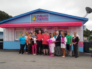 Shown at the Henderson-Vance Chamber of Commerce ribbon cutting for Pelican’s SnoBalls, are, from left, front row: Debi Allison, BB&T; Tommy Hester, Chair, Vance County Board of Commissioners; Mike Snee and Melody Parsons, Owners; Mayor Pete O’Geary; Joy Irvine; second row: Christian Wirtz;; Julia Langston, Henderson Family YMCA; Rick & Judy Seakins; Pierce Tooley; Nikita Johnson; Sam Fuquay; Adrian Johnson; Jahmila Peterson; Mova Dunn; Kevin Irvine; Cavan Irvine; Tristan Irvine; John Barns, Henderson-Vance Chamber President and Susan Rogers, Chick-fil-A.