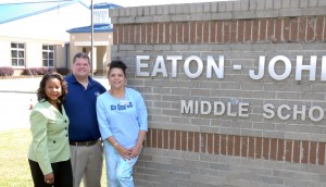 From left, VGCC Dean of Business & Applied Technologies Angela Gardner-Ragland, Eaton-Johnson Middle School Principal Dr. Larry Webb and counselor Dr. Priscilla Chavis-Lockley pose in front of the middle school. (VGCC Photo)