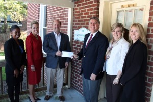 The Boys & Girls Clubs received $8,000 from Triangle North Healthcare Foundation’s Chairman Eddie Ferguson and Executive Director Val Short during a presentation on Tuesday from the proceeds of the Foundation’s 2nd Annual Golf Tournament held last month.  Attending the presentation were, from left,  April Scott, Boys & Girls Clubs Acting Director, Tanya Evans and Paul Harris, from the Boys & Girls Clubs Board of Directors, Ferguson, Short, and Jeannie Adcock, from Maria Parham Medical Center.