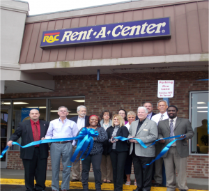 Shown at the Henderson-Vance Chamber of Commerce ribbon cutting for Rent-A-Center are, from left, Gregg Lunsford, Rent-A-Center Account Manager; Tommy Hester, Chair, Vance County Board of Commissioners; Ericka Banks, Rent-A-Center Account Manager; Bobbi Kille, Rent-A-Center Store Manager; Mayor Pete O’Geary; Marcus Hodge, Rent-A-Center Assistant Manager; Second row, Michael Bobbitt, Ambassador; Jenny Hester, Prim Development; Melanie Mann, HVCC Office Manager; Clareese Moss, New You with Shortcake; Hal Mutzel, Express Employment Professionals; John Barnes, President, Henderson Vance Chamber of Commerce. (Not pictured) Annette Roberson, HVCC Director of Membership was also in attendance.