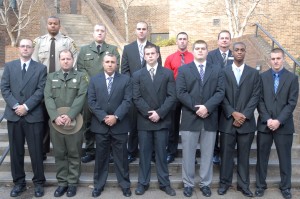 On front row, from left, VGCC Basic Law Enforcement Training Class 97 graduates Phillip Joel Trivette, James Thomas Rusher, David Warren Jacobs, Cody Marshall Tuck, Ryne Ty Shellman, Tevin Demetri Dixon and Zachary Edwin Lambert; on back row, from left, Keishawn Lamar Mayes, Andrew James Boos, Cody Jacob Goldsmith and Devin Shaun Whitlow with VGCC law enforcement training coordinator Tony Pendergrass. (VGCC Photo)