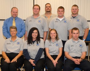 From left, seated: instructor Vivian Loyd with graduates Melissa Clark, Ruby Wheeler, and Quentin Woody; from left, standing: EMS coordinator Stephen Barney with graduates Dylan Cash, James Poteat, Gavin Frederick and Richard Lovings. (VGCC photo)