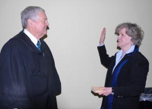 Judge Robert H. Hobgood (left), Senior Resident Superior Court Judge for the Ninth Judicial District, swears in N. Annette P. Myers, Vance-Granville Community College’s new member of the Board of Trustees, at the board’s regular monthly meeting on Monday, March 17. Myers is finishing the term of Ron Alligood, who resigned recently. She was appointed by the Granville County Board of Commissioners. (VGCC photo)