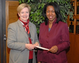 Val Short, the executive director of the Triangle North Healthcare Foundation (left), formally presents the scholarship donation to Dr. Stelfanie Williams, the president of VGCC. (VGCC photo)