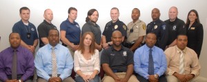 Seated, from left, are Criminal Justice graduates Willis Carter, John Branche, Toni Pleasants, Rodrick Fields, William James and Jason Boone; standing, from left, are graduates Adam Hight, Ronnie McAdams, Patricia Ford, Bryan Carey, Christopher Martin, Anthony Hargrove, Anton Edwards, Nicholas Williams and instructor Andrea Ferguson; not pictured: graduates Kimberly Alston, Lynne Curl, Kelvin Fisher and Brad Knutson. (VGCC photo)