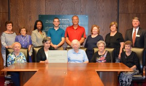 A group gathers in the board room at VGCC to celebrate the creation of a new scholarship honoring Ann Rose Allen. Seated, from left: Guild volunteer Dorene Hedrick, Guild president Anne Bunch, Ann Rose Allen, Gean Bobbitt and Nancy Moody; standing, from left: Pat Tharrington (friend of Mrs. Allen), volunteer Janet White, VGCC President Dr. Stelfanie Williams, Daniel Allen of Fuquay-Varina (grandson of Mrs. Allen), Rob Allen of Fuquay-Varina (son of Mrs. Allen), Sarah Falkner and Susan Adcock (friends of Mrs. Allen), and VGCC Endowment Fund Director Eddie Ferguson. (VGCC Photo)