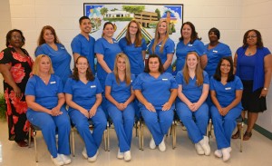 Seated, from left: graduating Medical Assisting students Gayla Lassiter, Brittany Daniels, Morgan Grissom, Kimberly Jackson, Ashley Pulliam-Scarberry and Sarahi Martinez Lara; standing, from left: program head Donna Gardner, students Christina Guy-McFarland, Henrry Rebollar-Miguel, Candace Bray, Ashley Day, Hillary Flanagan, Tiffany Finch, Sharon Greene and instructor Patrice Allen. (VGCC photo)