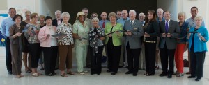 Shown at the Henderson-Vance Chamber of Commerce ribbon cutting for Henderson Community Concert Association are, from left; Jenny Hester, Prim Development and HVCC Board Chair; Linda Weaver, Board Member; Trisha Kleczek, Board Member; Vivian McIntyre, Second Vice President HCCA; Deborah Brown, Vance County Board of Commissioners Chairperson; Jan McDaniel, Third Vice President HCCA; Jane Frazier, President HCCA; Mayor Pete O’Geary; Cindy Ellington, First Vice President HCCA; James Edwards, Treasurer HCCA; Peggy Jackson, Hospitality Chair HCCA; Second row: John Barnes, HVCC President; Chamber Ambassador Pam Norwood, Magnolia Management; Sue Young; Chamber Ambassador Michael Bobbitt; Mark Hopper, Publications Chair HVCC; Kim Jordan, CCB VP Market Executive & Chamber Board member; Don Jenkins, First Vice President HCCA; Phil Hart, Dataforge Owner & Chamber Board member; Harold Frazier; Phil Young, Concert Chair HCCA; Felix McDaniel; Ruth Hartness, Membership Secretary HCCA; Peggy Jackson, Hospitality Co-Chair HCCA; Eddie Ellington, E Z Car Care Center; Not pictured: Annette Roberson, Director of Membership Services HVCC; Melanie Mann, HVCC Office Manager.