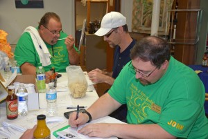 From left, VGCC Culinary Arts program head Chef Ross Ragonese, student Randy Wilfong of Henderson, and instructor Chef John Boretti taste sauces and mark their scores while serving as judges at the eighth annual North Carolina Hot Sauce Contest in Oxford on Sept. 13, 2014. (VGCC photo)