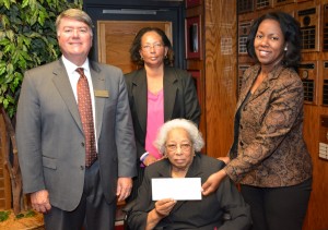 Geraldine Green Gooch (seated) and Katrina Gooch Lawson (standing, center) present contributions to the VGCC Endowment Fund, represented by Endowment Director Eddie Ferguson (left) and VGCC President Dr. Stelfanie Williams (right). (VGCC photo)