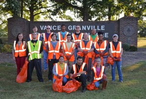VGCC Criminal Justice Club members take a break during their clean-up along Poplar Creek Road in front of the college’s Main Campus. Kneeling in front, from left, are Janet Rodriguez Morales of Henderson, William Douglas of Henderson and Stacie Bowes of Henderson; standing in middle row, from left, are Jordan Dickerson of Oxford, Joseph Toto of Oxford, Benjamin Layton of Kittrell, Marshall Keeton of Butner, Paul Grenier of Oxford, Jasmine Allen of Warrenton and Karly Blue of Stem; standing in back, from left, are Nicolas Parkstone of Stem, William Nutt of Henderson, Isaiah Blanchett of Monroe, James Hann of Creedmoor and instructor/club advisor Tony Clark. (VGCC photo)