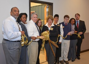 Officials ceremonially cut the ribbon, opening the Mechatronics lab at VGCC’s South Campus. Pictured, from left, they included Kenneth Wilson, VGCC’s project manager for the Trade Adjustment Assistance Community College and Career Training (TAACCCT) Grant; Dr. Stelfanie Williams, president of VGCC; Keith Shearon, VGCC’s Mechatronics program head/instructor; Sara Lloyd, VGCC’s director of customized training; Cecilia Wheeler, president of the Granville County Chamber of Commerce and dean of VGCC’s South Campus; Dr. Angela Ballentine, VGCC’s vice president of academic and student affairs; Wesley Williams, VGCC’s applied technologies department chair; Angela Gardner-Ragland, VGCC’s dean of business and applied technologies; and Stan Winborne, career and technical education director for Granville County Schools. (VGCC photo)