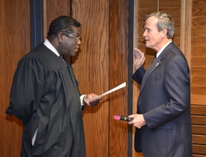 District Court Judge J. Henry Banks Jr. of the Ninth Judicial District, left, administers the oath of office to Vance-Granville Community College's newest trustee, Danny W. Wright of Henderson, on Monday evening at the board's regular meeting. Wright is returning to the board after being appointed by the Vance County Board of Commissioners. (VGCC photo)