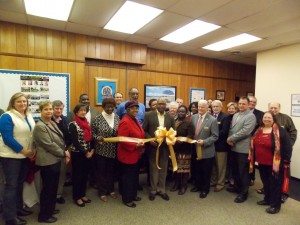 Shown at the Henderson-Vance Chamber of Commerce ribbon cutting for Tegarris Associates Realty, Inc. are, Terry Garrison, CEO, Broker/Realtor; Charles Wilson, Realtor; Commissioner Deborah Brown, Realtor; Freddie Harris, Realtor; Arline Richardson, Realtor; Shirley Gray, Administrative Assistant for Tegarris Associates Realty; Mayor Pete O’Geary; Jenny Hester, Prim Development and HVCC Board Chair; John Barnes, HVCC President; Vance County Manager Jerry Ayscue; Chamber Ambassador Michael Bobbitt; Phil Hart, Data Forge & Chamber Board member; Stuart Litvin, Vance Cty. Economic Dev. Commission & Chamber Board Member; Hal Mutzel, Express Employment & Chamber Board member; Ed O’Brien, Walmart DC General Manager & Chamber Board member; Chamber Ambassador Val Short, Triangle North Healthcare; Patsy Rivers, Fidelity Bank Manager; Tammy Care, Maria Parham Medical Center & Chamber Board member; Mel Manning, Quality Investments Controller & Chamber Board member; Tonya Burrell, Owner Lotus Lounge Day Spa & Café; Joyce Doughty, Owner Tots 'N More Consignment Boutique; and other business and community leaders.  Not pictured: Melanie Mann, HVCC Office Manager; Annette Roberson, HVCC Director of Membership Services; Connie Ragland, Work First Coordinator.