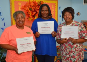 St. Paul Presbyterian Day Care Center employees who completed the VGCC training included, from left, Barbara Terrell, Keshia Thorne and Brenda Lynch, all residents of Louisburg. Not pictured: Mary Spencer. (VGCC photo)
