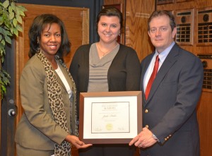 Dr. Stelfanie Williams (left), the president of VGCC, and Dr. Ken Lewis (right), the college’s vice president of institutional research and technology, present a certificate of completion from the Data and Decisions Academy to Julie Hicks (center). (VGCC photo)