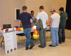 LaToya Caldwell of the N.C. Department of Transportation Office of Equal Opportunity & Workforce Services talks with attendees about careers and training opportunities at VGCC’s first-ever Construction & Logistics Job Expo, held in April on the college’s Main Campus. (VGCC photo)