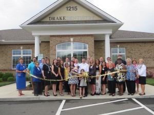 Shown at the Henderson-Vance Chamber of Commerce and Granville County Chamber of Commerce ribbon cutting for Drake Dentistry are, Dr. Alex Drake and his family, staff, along with Chamber representatives and city and county officials. 