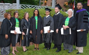 From left, Paralegal Technology program head/instructor Antoinette Dickens, graduates Kristy Hope, Megan N. “Nikki” Finch, Tanisha Bullock, Safwan Ali, Kevin Allen, Donna McAllister and instructor Marque Debnam, are seen here on VGCC’s Main Campus shortly after their commencement exercises in May. Not pictured: graduate Michelle Williams. (VGCC photo)