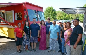 Some of the participants in VGCC’s first Food Truck Entrepreneurship class are pictured here by the Chick-n-Que truck at the first Mini-Food Truck Rodeo held at VGCC’s Franklin County Campus. From left are instructor Queen Harris, Tanya Weary, students Chuck Odom of Louisburg, Whitney Abbott of Kittrell, Randy Rowland of Kittrell, Lonnie Peace of Oxford, Bryan Coppedge of Warrenton and Alicia Blackwell of Henderson, with former VGCC Personal Enrichment coordinator Emily McCormick and Ernest Harris, the co-owner/operator of Chick-n-Que. (VGCC photo)