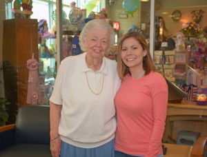 From left, Ann Rose Allen and VGCC student Erica Medlin are pictured in front of the Guild Gift Gallery at Maria Parham Medical Center. (VGCC Photo)