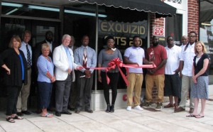 Shown at the Henderson-Vance Chamber of Commerce ribbon cutting for EXQUIZID CUTS 2.0 are, Lucas Perry, Owner and Barber;  Barbers Dwayne Macon, Melvin Jordan, Quinn Shearin and Cornelius Nile; Stylist Omar Evans and Christine Fields; Pastor; Mayor Pete O’Geary; HVCC President John Barnes; Chamber Ambassador Michael Bobbitt; Chamber Ambassador Clareese Moss, Shortcakes; Louis Williams and Kimberly Robinson, Rosemyr Corporation. Not Pictured: HVCC Office Manager, Melanie Mann