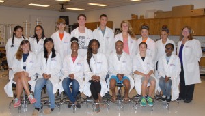 Students shown here at VGCC’s Franklin Campus are, seated, from left: Rachael Basham of Wake Forest, a home-schooled student who is also taking VGCC classes, Juanita Pacheco-Sosa (Louisburg High School), Savannah Staten (Enloe High School), Kayla Wilmot (Enloe High), Joshua Bass (Franklinton High School), Jessica Schneider (South Granville High School) and Destiny Harden (Johnston County Early College Academy); standing, from left: Janneth Arrieta Reyes (Warren Early College High School), Tiara Daniel (Warren Early College High), Kyle Brady of Fuquay-Varina, a home-schooled student, Drew McDonald (Sanderson High School), Justice Shuta (South Granville High), Kyndal Gunter (South Granville High), Cierra Mills (recent Ravenscroft School graduate), Michala Mills (recent Ravenscroft School graduate) and instructor Becky Brady. (VGCC photo)
