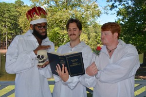 From left, VGCC students Jordan Bunting, Lee Powell and Spencer Nunn get into character outside on the college campus, while checking out the source material for “The Compleat Wrks of Wllm Shkspr (Abridged).” (VGCC photo)