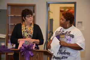 Pam Hester (left), the executive director of the nonprofit organization Families Living Violence Free, is introduced to the VGCC South Campus audience by Roberta Freeman, who coordinated the program on her campus. (VGCC Photo)