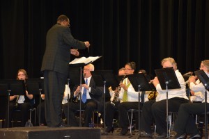 Ivory Brock conducts the Vance-Granville Community Band during the 2014 holiday concert. (VGCC photo)