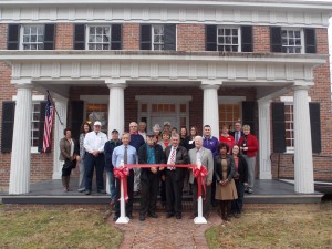 Shown at the Henderson-Vance Chamber of Commerce ribbon cutting for The Corbitt Preservation Association are, Charles Powell, President; Tommy Roberson, Curator for the Museum; Kenneth Stegall, Treasure and other members of The Corbitt Preservation Association; family and friends; Mayor Pete O’Geary; HVCC President John Barnes; Chamber Ambassador Kevin Bullock, WIZS 1450 AM; Chamber Board member Hal Mutzel, Express Employment; Chamber Ambassador Val Short, Triangle North Healthcare; McKinley Perkinson, Marketing Director – Maria Parham Medical Center; Jennifer Clement, Occupation Health/Physicians Relations Director – Maria Parham Medical Center; Patti McAnally, Director Perry Memorial Library; Al Rivers, Broker – Coldwell Banker Advantage; Willard Jackson, Broker-Coldweld Banker Advantage; Melanie Mann, HVCC Office Manager; Vanessa Jones, HVCC Work First Coordinator. Not Pictured: HVCC Director of Membership Services, Annette Roberson.