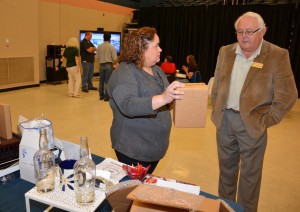 Theresa-steve-wmr.jpg: Theresa Chiplis (left) from WMR Packaging & Design talks with Steve Woodworth, head of VGCC’s Global Logistics & Distribution Management program, during the Business Technologies Fair. Chiplis, a graduate of the Global Logistics program, works for WMR as a Systems/Logistics Specialist based at the company’s Creedmoor location. (VGCC photo)