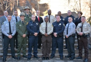 On front row, from left, VGCC Basic Law Enforcement Training Class 101 graduates Tony Joseph Tart, William Keegan Ruark, Travis Ty Womack, Wilbert Anthony Marrow, Brandon Jay Link, Thomas Henry Turner III, and Michael Wayne Martin; on back row, from left, VGCC instructor Glen Boyd, graduates Jason Tyler Wright, Jason Scott Penshorn, Jamison Patrick Vuolo, Elliott DeVar Carver, Tiquan Devard Terry and Patrick Ryan Fuqua, and VGCC law enforcement training coordinator Andrea Ferguson. (VGCC Photo)