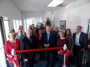 Shown at the Henderson-Vance Chamber of Commerce ribbon cutting for Propel GPS, LLC are, Company owner and CEO Rick Burtner; Director of Marketing and Administration, Propel GPS, LLC Sheri Jones; Propel GPS, LLC team members Justin Graley, Jason Gafa, Shelia Thomas, Nadia Onorati and Dustin Haines; Mayor Pete O’Geary; HVCC President John Barnes; Chamber Board Member Chair Tanya Evans, Duke Energy; Chamber Board Member Phil Hart, Data Forge; Chamber Ambassador Kevin Bullock, WIZS 1450 AM; Director Vance County Economic Development Stuart Litvin; Warren & Jeannie Nelms, Quick Print; Stephanie Ranes and Diane Robbins of the Daily Dispatch. Not Pictured: HVCC Director of Membership Services, Annette Roberson; HVCC Office Manager Melanie Mann.