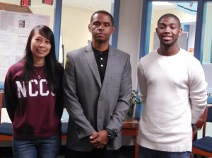 Steven Evans, center, joins Tiffany Nguyen of N.C. Central, left, and Kendrick Perry of East Carolina, right, during their visit to the school.