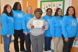 The staff of the VGCC Child Care Center, including, from left, Rhonda Pegram, Bridget Perry, Kathy Hughes, Deborah Harris, Lizzie Nelms, Pam Harris and Hilda Cordell, proudly display the certificate indicating the center’s renewed five-star license. (VGCC Photo)