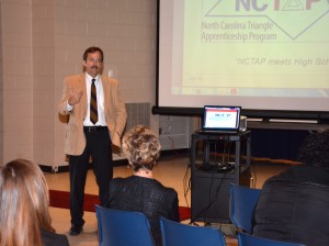 Kent Misegades, vice chairman of the NC Triangle Apprenticeship Program, speaks at VGCC to representatives of local employers, economic development agencies and school systems. (VGCC photo)