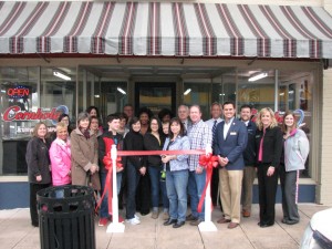 Shown at the Henderson-Vance Chamber of Commerce ribbon cutting for Kerr Lake Cornhole & Vinyl Graphics are, Company owners Anthony and Gail Hatchel, Kerr Lake Cornhole & Vinyl Graphics, family and staff; Mayor Eddie Ellington; Henderson-Vance Chamber of Commerce, President John Barnes; HVCC, Workfirst Coordinator Vanessa Jones; Stephanie Ranes and Diane Robbins of the Daily Dispatch; HVCC, Ambassador Clareese Moss, Shortcakes; HVCC, Ambassador Tonya Moore, KARTS; Benchmark Community Bank, Ann Lawson; PRIM Development & Rentals, Jenny Hester; Henderson Downtown Development, Carolyn Powell; HVCC, Ambassador Joan Robinson, Kittrell Job Corps; BB&T, Mkt Leader/Assistant Vice President Sallie White; Fidelity Bank, Office Manager Brooks Andrews; W.W. Properties, Curtis White; Pinnell Insurance Agency, President John Cook.  Not Pictured: HVCC, Director of Membership Services, Annette Roberson; HVCC, Office Manager, Melanie Mann.