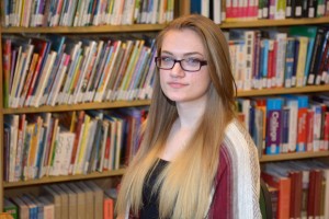 Elizabeth Caulfield of Louisburg, seen here in the library on VGCC’s Franklin County Campus, is the college’s recipient of the North Carolina Community College System’s Academic Excellence Award for 2016. (VGCC Photo)