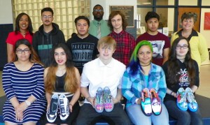 SVHS art students include, front row from left, Sandy Hernandez, Ashley Mosley, Cameron Hux, Aliyah Wright and Krista Pendergrass. On the back row are, from left, Assistant Principal Mcshell Edmonds, Jose Reyes, Jose Gonzalez, Tony Elberson, Jordan Salazar and Principal Stephanie Ayscue. Standing at back center is Assistant Principal Desmond Thompson.