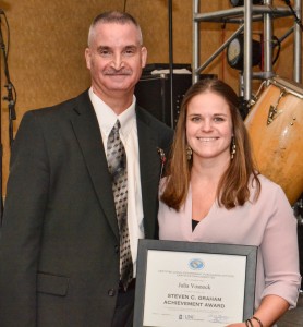 From left, VGCC Vice President of Finance and Operations Steven Graham presents the first award named in his honor to Julia Vosnock, Procurement Manager with the Cape Fear Public Utility Authority.