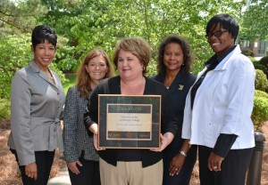Shown from left with the plaque awarded by NCMPR to VGCC for the “Vanguard Voyager” are Dr. Angela Ballentine, VGCC vice president of academic and student affairs; Cynthia Young, dean of arts and sciences; Beth Gray, publications coordinator for the VGCC Communications department; Angela Gardner-Ragland, dean of business and applied technologies; and Angela Thomas, dean of health sciences. Gray designed the Voyager from data submitted by VGCC faculty and staff coordinated by the college’s deans under the leadership of Dr. Ballentine. Not pictured: Dale Fey, VGCC dean of continuing education. (VGCC photo)