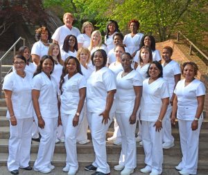 Graduates honored at the VGCC Practical Nursing pinning ceremony included, first (front) row, from left: Sarala Neupane, Rita Udjoh, Adeola Sonaiya, Nzinga Taliaferro, Maena Simmons, Jeanne Tropnas and Winrose Githiiyi; second row, from left: Kaneshea Thomas, Jessica Rooks, Lisa Perry, Amber McKee, Jennifer Crowder, and Branice Chogo; third row, from left: Andrea’ Thompson, Dorcas Smith, Emilee Carlson, Jane Gathogo and Annah Ongeri; fourth row, from left: William Autrey, Heather Tunstall, Latonya Morton and Lilian Schleifer. (VGCC photo)