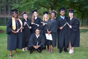 Several VGCC Student Government Association officers are seen here shortly after they graduated from the college on May 13, including, standing, from left, Emory Gant-Hawkins, Cassandra Saroza, Isabelle Louise Snyder, Lydia Hendrick, Angelique Taylor, Daniel Davis and Shane O’Malley; and kneeling in front, Keyante Lindsey. Three other SGA officers who are not pictured also graduated: Dianna DeWeese, Samantha Huffman and Aleria Perry. (VGCC photo)